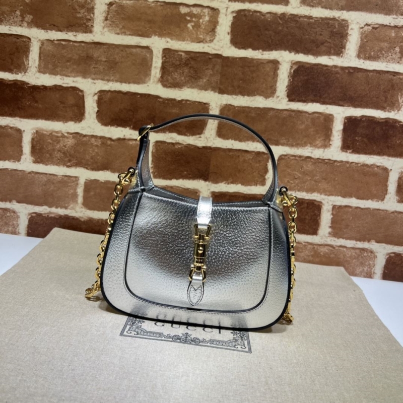 G*u*i top handle bags